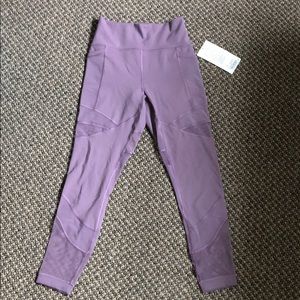 Lilac colored lululemon forget the sweat tight 8